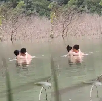 Quay được cảnh cặp đôi mò cua bắt cá dưới ao